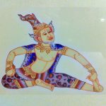 Traditional Southeast Asian mythological dancer in stretching pose